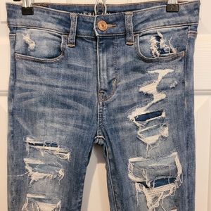 American Eagle Next Level Stretch Distressed and Patched Hi-Rise Jegging